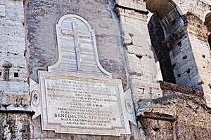 Detail of the Colosseum in Rome with the famous inscription by Pope Pius IX recalling the restorations carried out in 1852 on the
