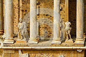 Detail of columns and statues in the public Roman theater of MÃÂ©rida photo
