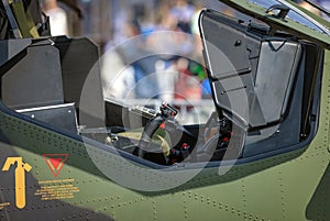 The detail of the the control lever and panel in the cockpit of an combat helicopter