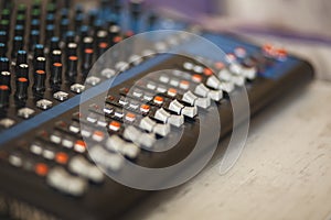 Detail of the controls of an Audio Mixing Console.