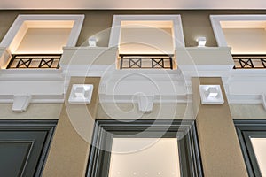 Detail of corner ceiling with intricate crown molding on column