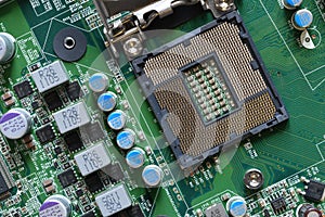 Detail of a CPU Socket on a Motherboard. Printed Circuit Board - Computer Motherboard with Components. Close-up