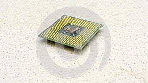 Detail of CPUs on white, the perfect fusion of technology and simplicity. Close-up of computer processors, technical elegance on a