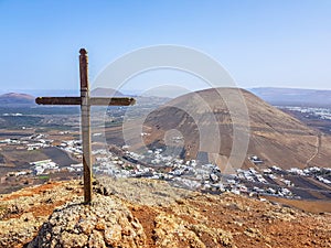 Detail of a cross in the cone of a volcano in the ascent to the volcano MontaÃÂ±a Blanca on the island of Lanzarote, Canary Islands photo