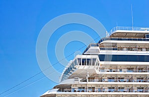 Detail of a cruise ship deck with clear blue sky in the background