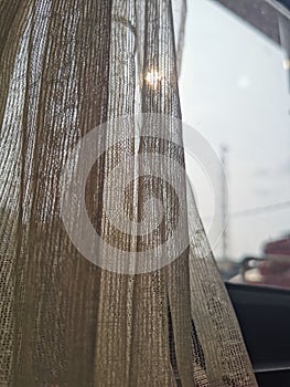 Detail curtain with slightly sun light