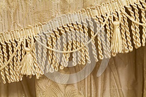 Detail of curtains with fringe and tassels