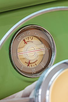 Detail of the dashboard of a classic fourties car