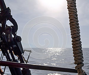 Detail of Deck, pulley block and ropes, rigging on a tall ship.