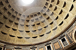 Detail of decorated unreinforced concrete Dome of the Pantheon, Rome, Italy with central opening (oculus) photo