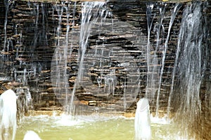 Detail of a decorative waterfall in the garden.