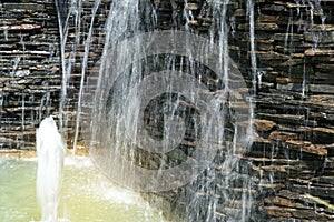 Detail of a decorative waterfall in the garden.