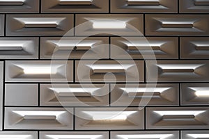 Detail design of aluminium ceiling block in brick pattern with led lighting integrated  in surface / detail aluminium / abstract b