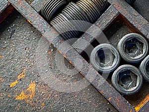 Detail of different metallic bolts and nuts