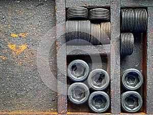 Detail of different metallic bolts and nuts