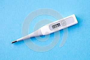 Detail of digital thermometer with 37,7 Â°C of fever