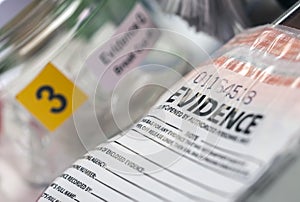 Detail of DNA sampling tubes in Laboratorio forensic equipment photo