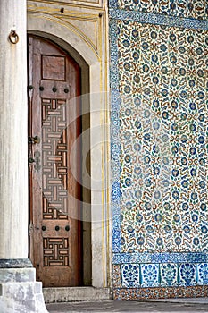 Detail of the door, column and frescoes of the ancient palace Topkapi photo