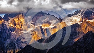 Detail of dramatic mountain range with colorful sunlight, Svaneti