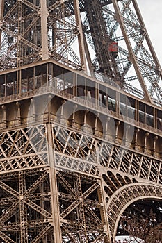 Detail of the Eiffel Tower in autumn in the rain in Paris