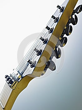 Detail of electric guitar cords and frets