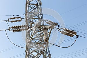 Detail of electric insulators from a high voltage power pylon