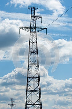 Detail of electricity pylon against blue sky