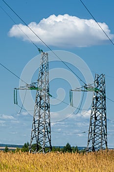 Detail of electricity pylon against blue sky