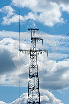 Detail of electricity pylon against blue sky