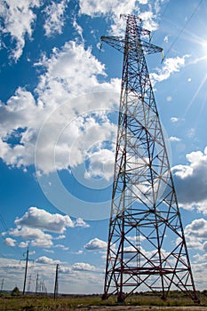 Detail of electricity pylon against blue sky