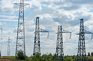 Detail of electricity pylon against blue sky