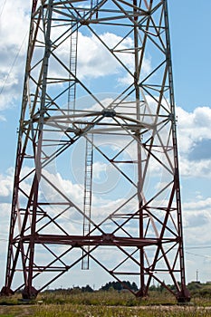 Detail of electricity pylon against blue sky