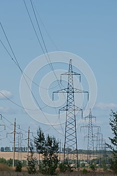 Detail of electricity pylon against blue sky