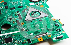 Detail of an electronic printed circuit board with many electrical components