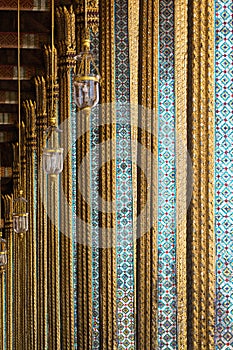 Detail of emerald Buddha temple columns in Bangkok, Thailand