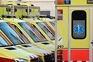 Detail of emergency ambulance cars in hospital yard