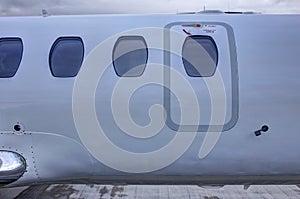 Detail of emergency exit of the small business jet