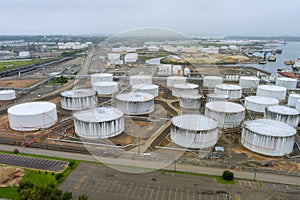 Detail of equipment oil pipeline steel with valve from large oil storage tank