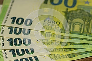 Detail of a 100 euros banknote. Money. Finance. Close up. Selective focus