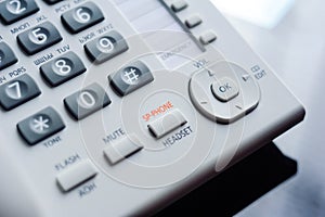 Detail of executive VoIP desk phone buttons