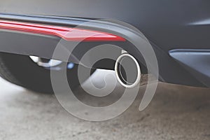 Detail exhaust pipe of a car.