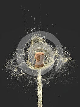 Detail of the explosion of a cork of a bottle of champagne