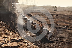 Detail of extractive machines in opencast mine photo