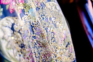 Detail of the fabric of a typical Valencian dress of fallera woman photo
