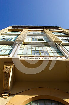 Detail of the facade of Casa de Cristales Building, Melilla Spain mixing Catalan Art Nouveau and Arabist architectural styles photo