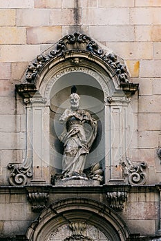 Detail of the facade of the church of Sant Felip Neri in the Gothic Quarter of Barcelona, Spain photo