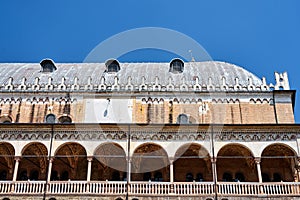 Detail of the facade with the colonnade of the medieval market hall Palazzo della Ragione in the city of Padua