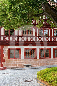 Detail of the facade of a half timbered old house