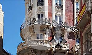 detail of the facade of a historical building and a wall street light, Cartagena, Spain