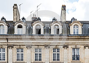 Detail of facade and mansard of old residential in Rennes